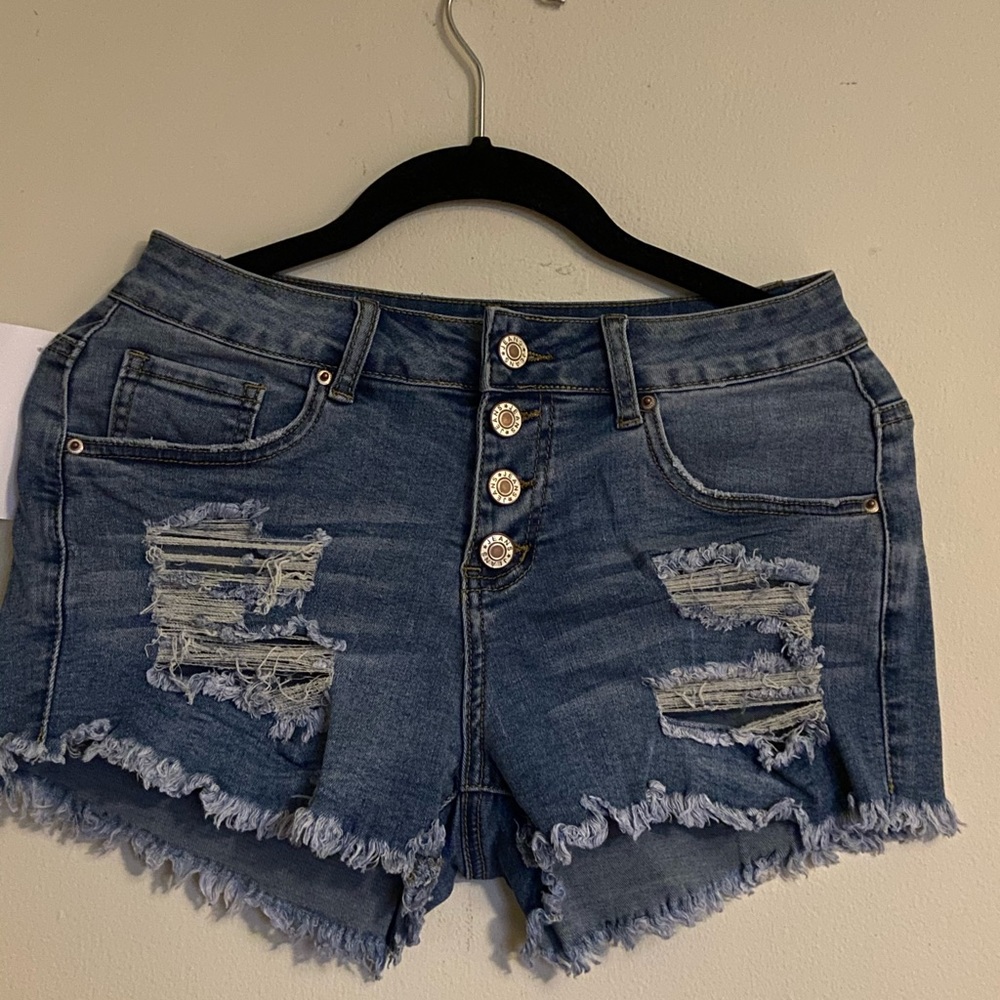 Distressed denim shorts